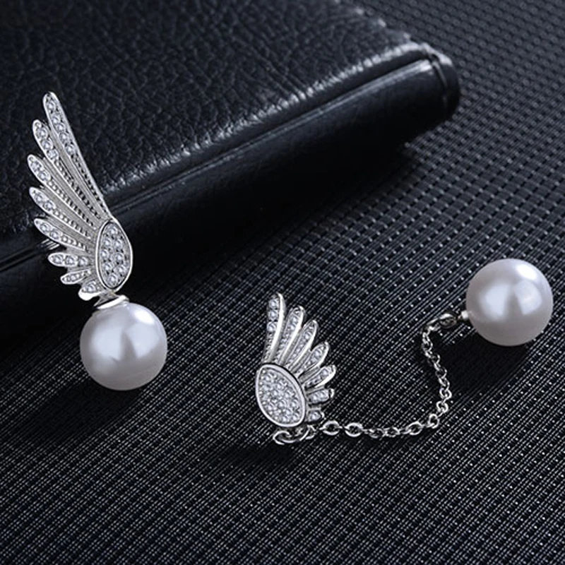 Женские серьги-гвоздики из серебра 925 пробы с двумя ангельскими крыльями |