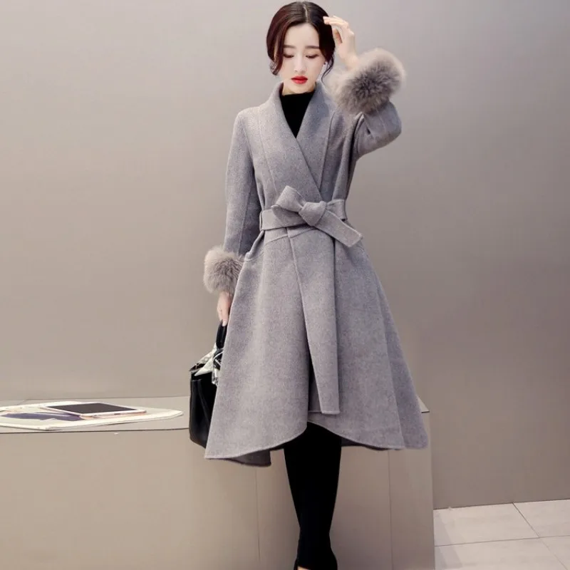 Женское шерстяное пальто на завязках асимметричное приталенное средней длины с