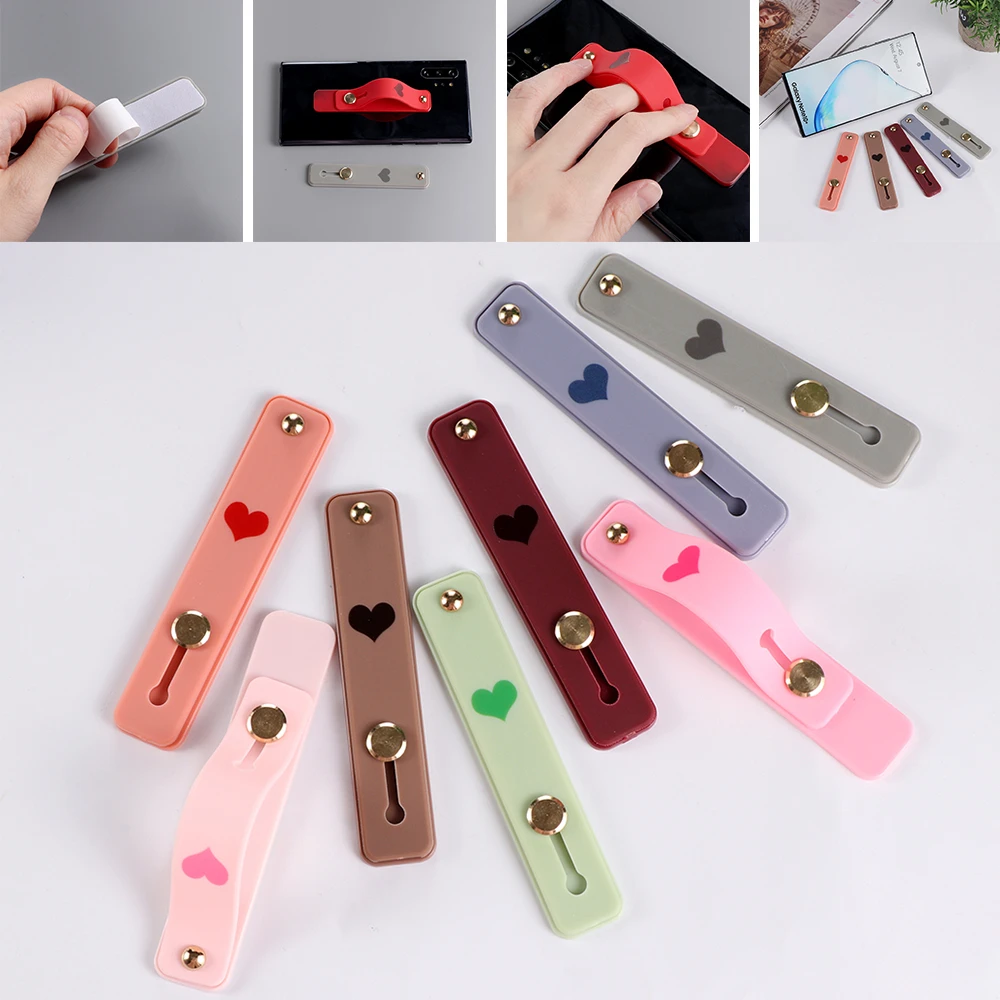 

Silicone Phone Holder Finger Ring Push Stretch Pull Grip Stand Heart Candy Color Bracket Buckle Wrist Mobile Universal Hand Band