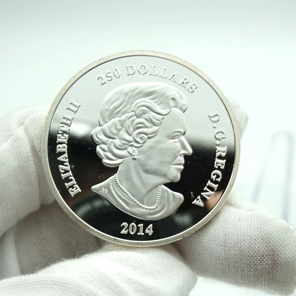 Монета с золотым и серебряным покрытием в виде канадского животного 1 унция -