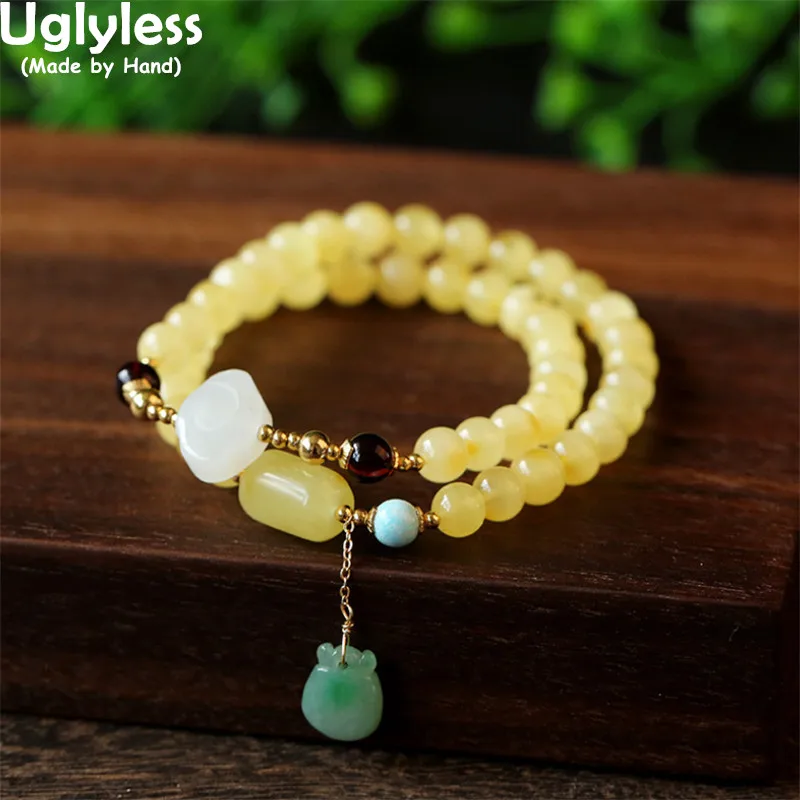 

Uglyless Natural Beeswax Amber Bracelets for Women Adjustable Elastic Jade Emerald Gemstones Beading Jewelry 9K Gold Bracelets