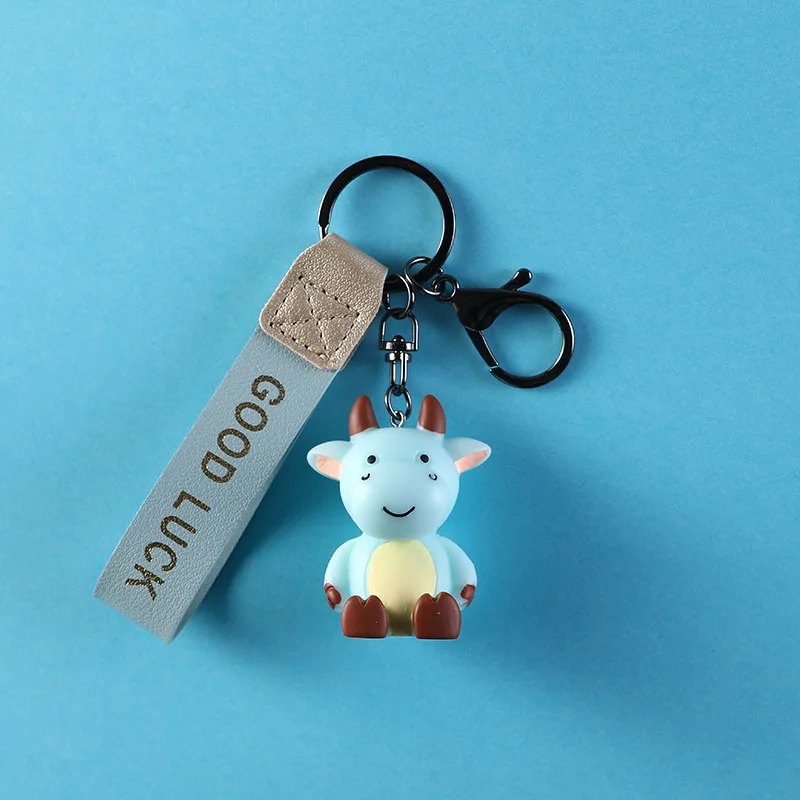 

Good Luck Cow Keychain Cartoon Red Blue White Charm Leather Rope Calf Key Chain Women Ladies Bag Pendant Keyring Friends Gift