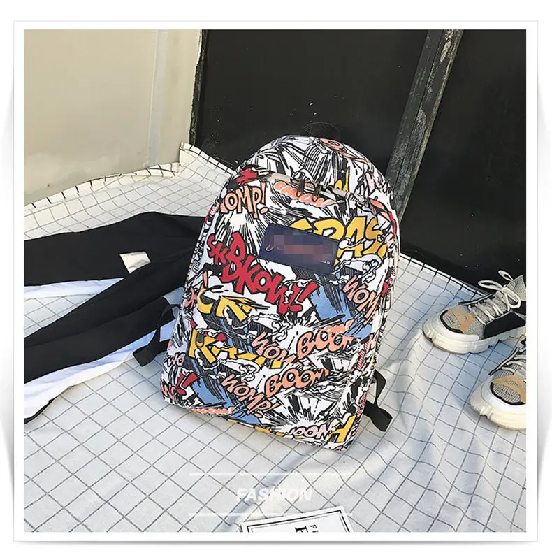 New backpack female cartoon alphabet doodle personality wild backpack men and women shoulder bag mochila
