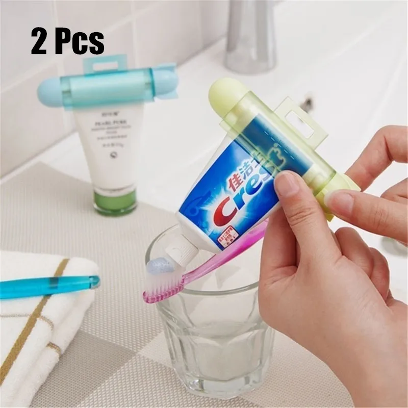 

2PCS ABS Cute Rolling Squeezer Toothpaste Dispenser Tube Partner Hanging Holder Press Rolling Holder Bathroom Accessories