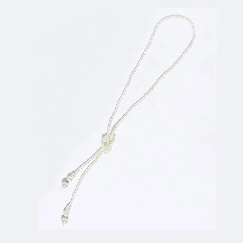 

1920s headdress necklace gloves cigarette holder