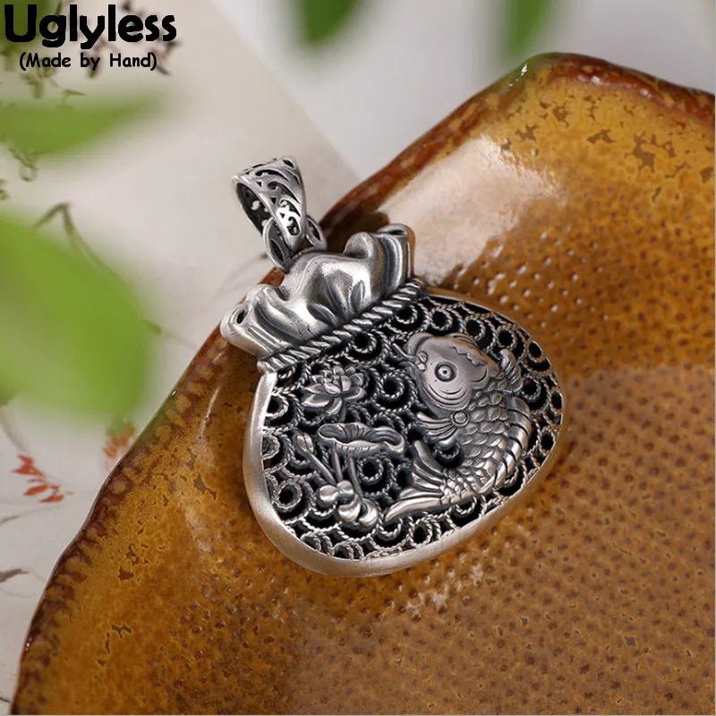 

Uglyless Vintage Hollow Money Bag Pendants for Women Embossed Fish Dragons Phoenix Necklaces NO Chains 999 Thai Silver Jewelry