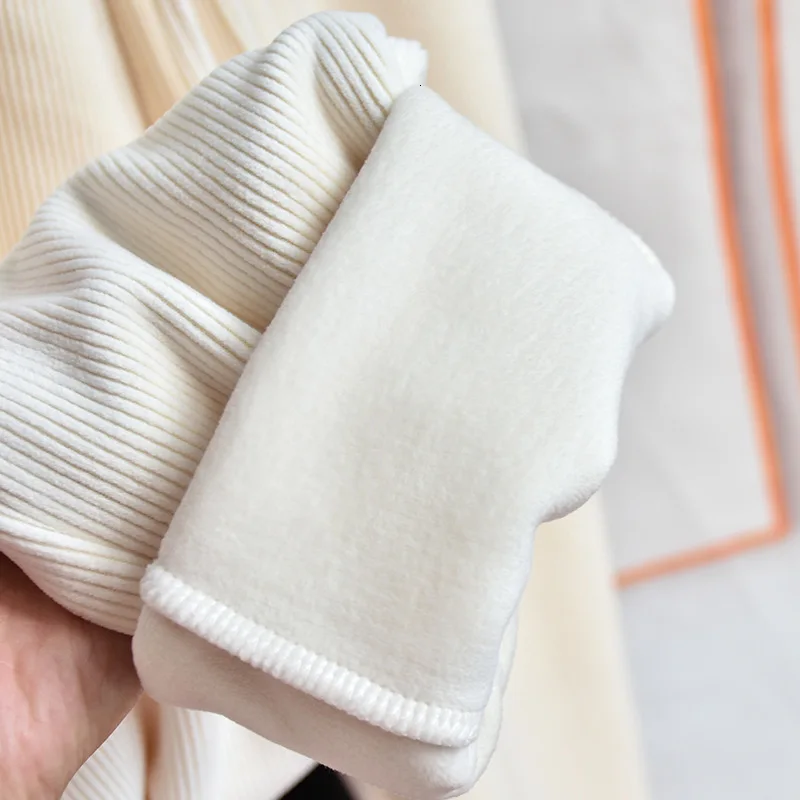 Утепленные зимние женские брюки с норковым пухом свободные мягкие эластичные