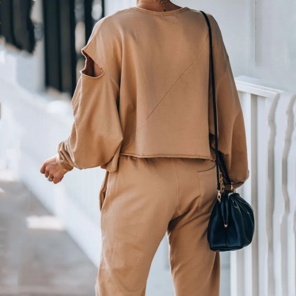 

2020 Autumn Winter New Fashion Solid Color Round Neck Long Sleeve Stitching Tshirt And Hole Pant Two Piece Set Women Sports Suit
