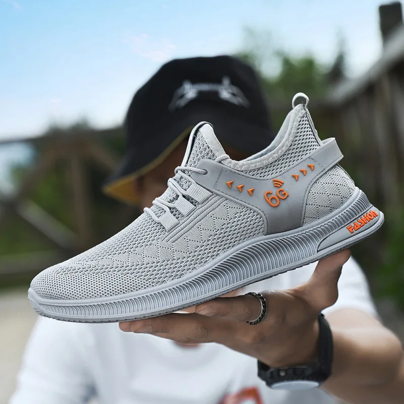 

Men's sports shoes Large size fly woven men's shoes spring and autumn low cut breathable casual men's fashion running sports men