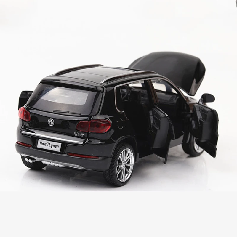 Модель литая автомобиля KIDAMI 1:32 Tiguan модель игрушечного со звуком и светом