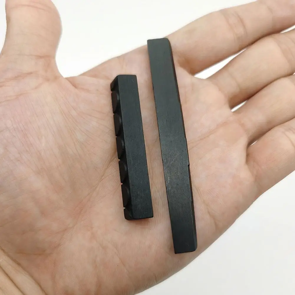 

2 шт./компл. седло гайка черные верхняя гайка (52x6x9 мм) + седло (80x3x 9/8 мм) для классической гитары, производство Китай