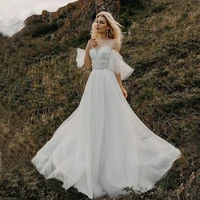 sheer o neck lace appliqued tulle a line wedding dress 2020 button back sweep train tulle bridal gowns abiti da sposa