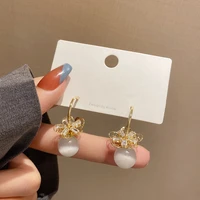 u magical korean clear crystal flower dangle earring for women hollow metallic cubic zirconia earrings jewelry accessories