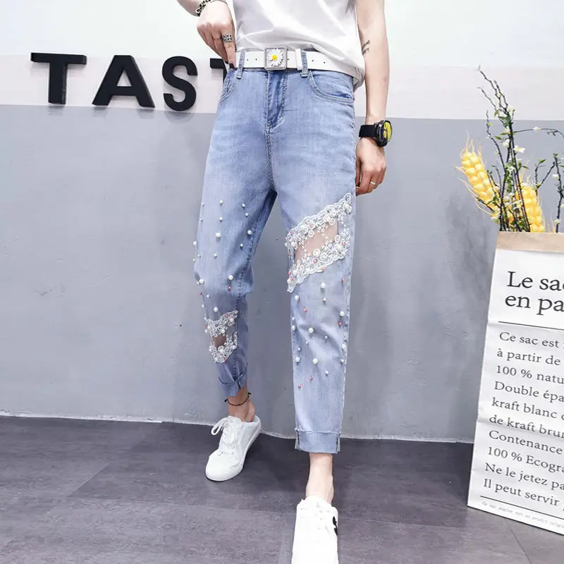 

European Women's Summer Jeans Beading Hole Lace Patchwork Elasticity Cross Pants High Waist Loose Ankle-Length Denim Trousers