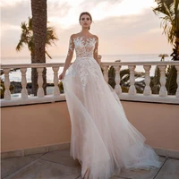 brilliant lace boat neck wedding dress 2021 new illusion tulle long sleeves lace applique sweep train for female bride gown hot