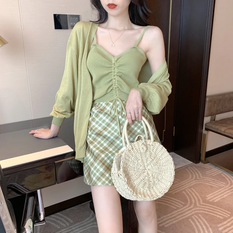 

New Fashion Green Knit Cardigan + Drawstring Camisole + Plaid Short Skirt Set