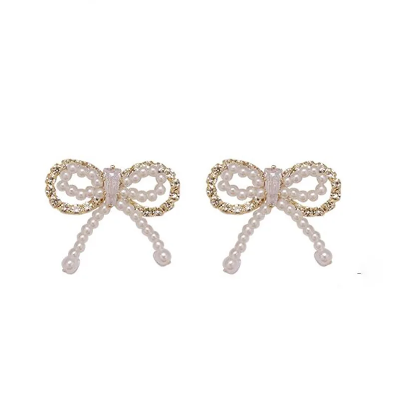 

Elegant pearl bow earrings 2021 new trendy double-layer hollow diamond earrings
