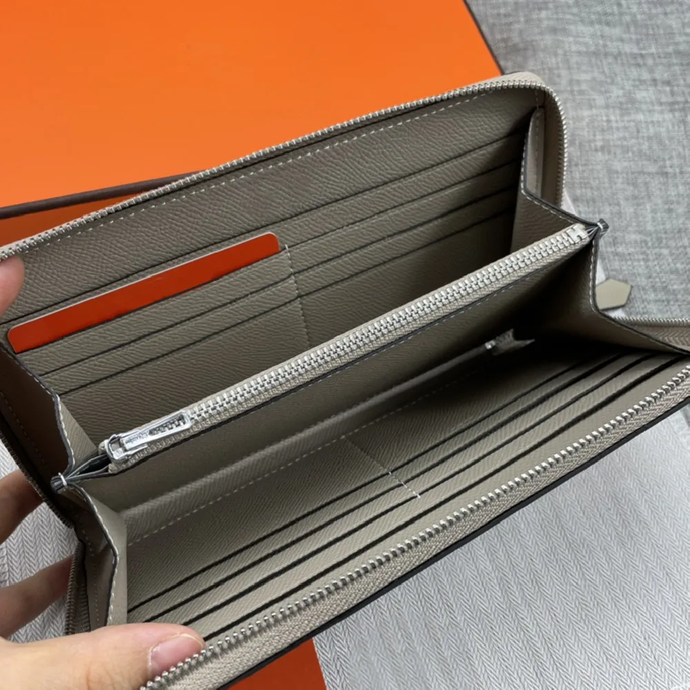 

Leather wallet ladies 2021 new luxury water ripple leather long zipper holding simple first layer cowhide soft leather wallet
