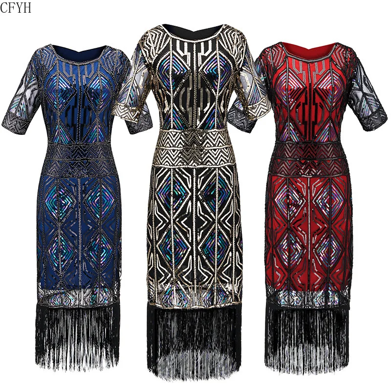 Винтажное женское платье с кисточками и блестками расшитое бисером оборками