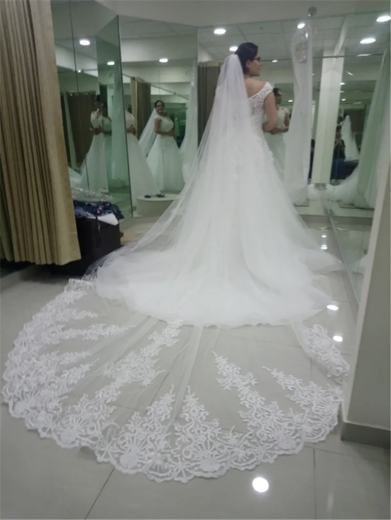 

Реальные фотографии длинная кружевная свадебная вуаль с гребнем 3 метра 1 слой собор белая свадебная вуаль свадебные аксессуары 2021