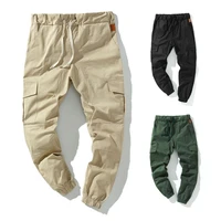 50 hot sales cargo pants solid color multi pockets men ankle tied drawstring pants for sports