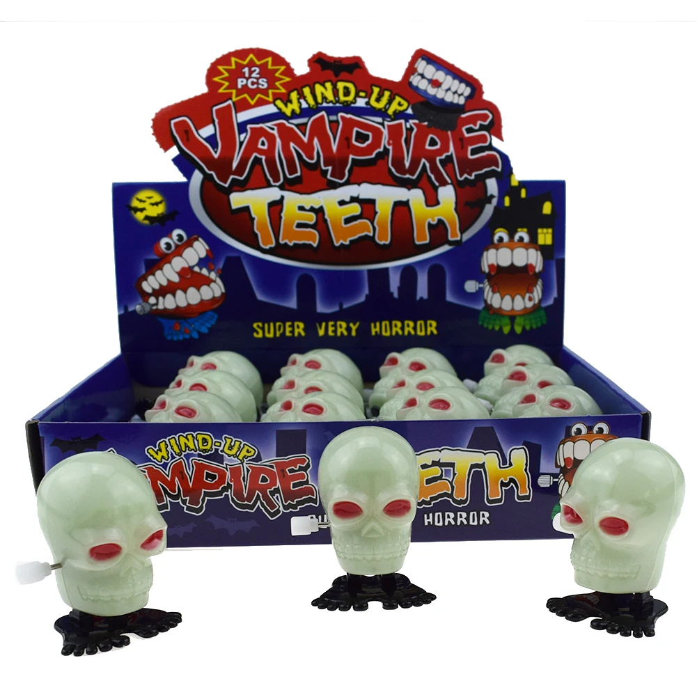 

20pcs/lot New Clockwork Jumping Glow in the Dark Luminous Effect Skull Wind Up Bounce Toy Props Toy Party Halloween Gift