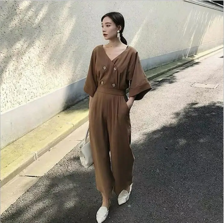 

Qooth Solid Color Women Jumpsuit 2020 Korean Summer Half Sleeve Buttons Ankle Length Causal Jumpsuits Long Rompers Preppy Style