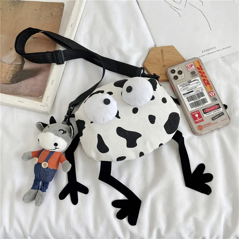 

Canvas bag female Japanese cow messenger bag Korean Girl funny cute ugly all-match student shoulder bag