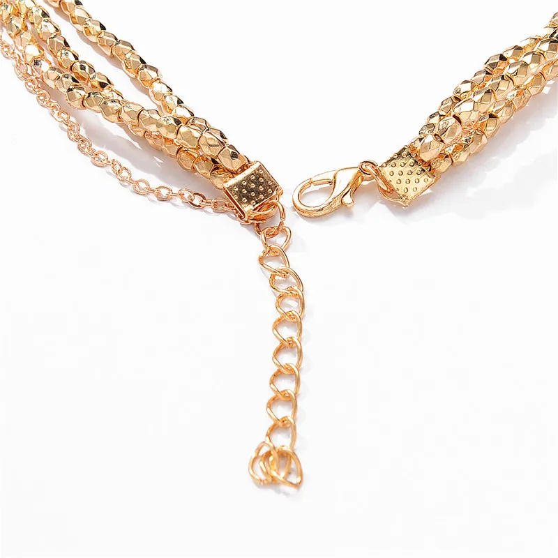 Женское многослойное колье чокер золотистого цвета с подвеской в виде звезды из