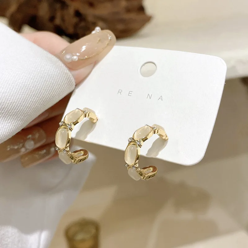 

s925 silver needle opal C-shaped earrings Korean retro fashion wild earrings cold wind high-end earrings earrings women