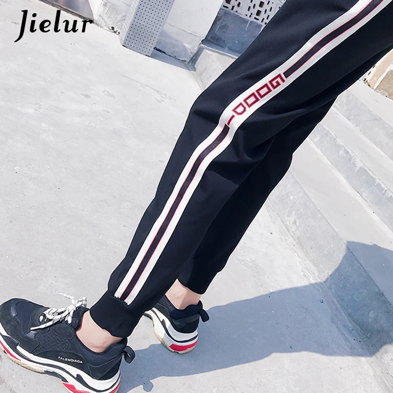 

Jielur Autumn Winter Sports Pants for Women Casual Loose Harem Pants Female Harajuku Side Striped Patchwork Black Pantalon M-XXL