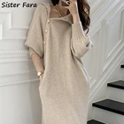 Женское трикотажное платье-свитер с высоким воротом