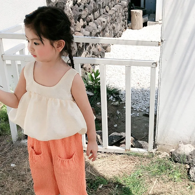 

Summer girl solid color sleveless Camisoles top Fashion Backless Bow Tanks simple casual party vest Kid clothing for girl