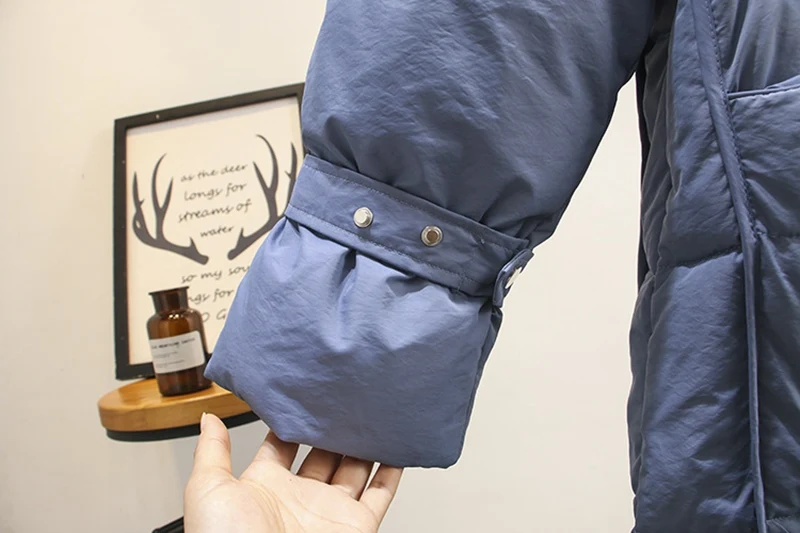 Женская зимняя куртка с капюшоном длинная однотонная модная меховым воротником