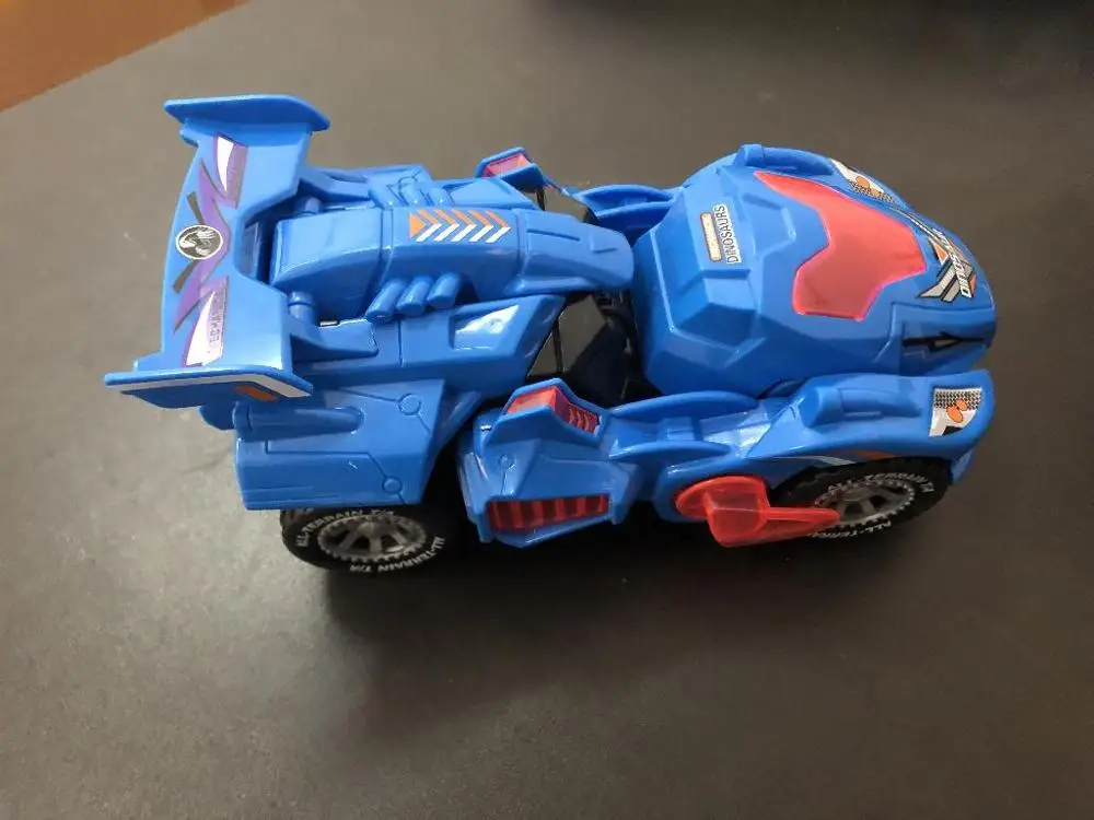 Деформация Электрический динозавр автомобиль игрушка универсальное колесо