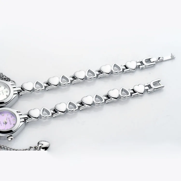 

NO.2 Women Bracelet Watch Ladies Tassel Dress Quartz Watch Clock Hollow Love Hearts Steel Strap Wrist Watch Montre Femme