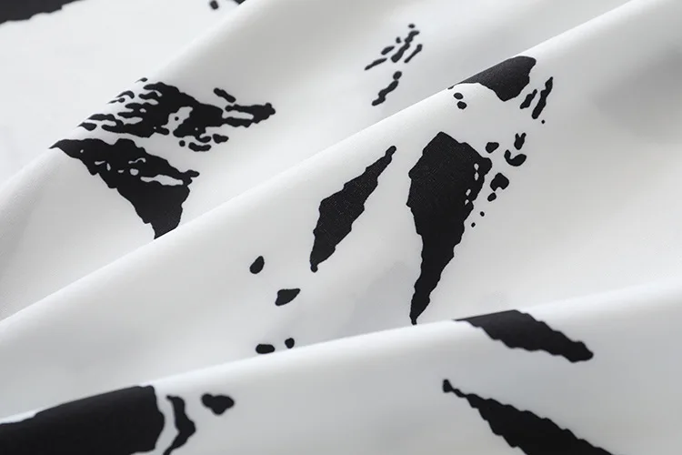 

Fashion Womens tops and blouses 2021 autumn black and white irregular printed lapel long-sleeved loose shirt women Tops Blusas