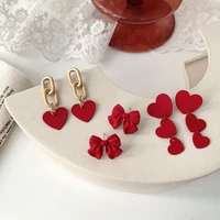 wonderful red color spray alloy love heart knotted pendant earrings for women ladies long heart tassel earrings accessories