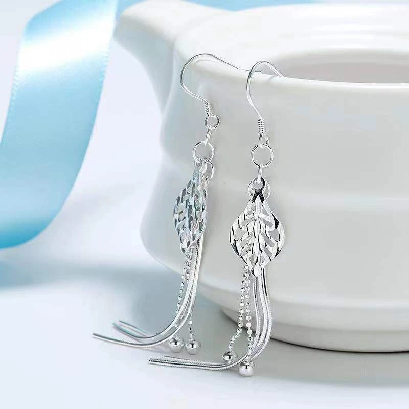 

Hollow leaf tassel earrings