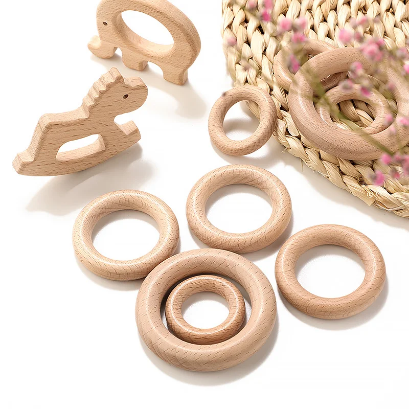 

TYRY.HU 100Pcs Baby Wooden Teether Ring Natural Wood Teething Toy Food Grade Wooden Teether Nursing Pendant Teething Toys