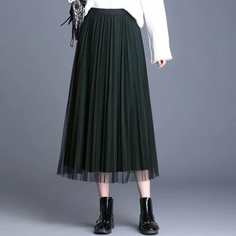 

Women's mid length dress with mesh skirt on both sides