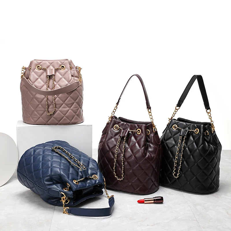 

Women's cylindrical sheepskin handbag, high quality handle handbag, large capacity Bracelet design