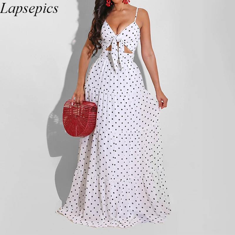 

Женское платье-макси с бантом и принтом в горошек