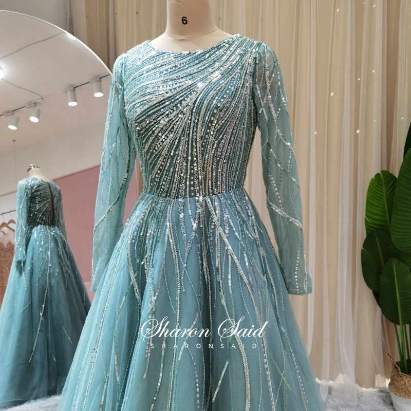 Мусульманское вечернее платье с длинным рукавом роскошное синее средней длины