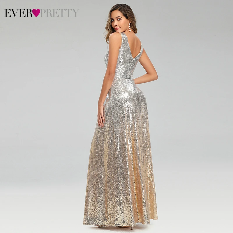 Длинные серебристые вечерние платья трапеции с блестками и глубоким V образным