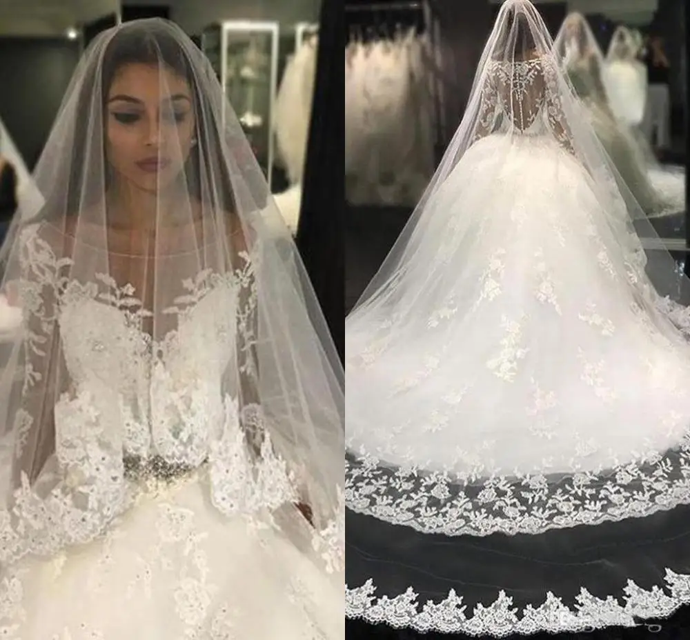 

Scoop Neck Arabic Dubai Ball Gown Wedding Dresses Appliqued Lace Long Sleeve Beaded Bridal Gown Illusion Back Vestidos De