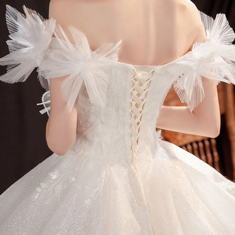 

Wedding Dress Illusion Off The Shoulder Sequined Pearls Lace Embroidery Backless Floor-Length Tulle Luxury Lady Bride Gown TS684