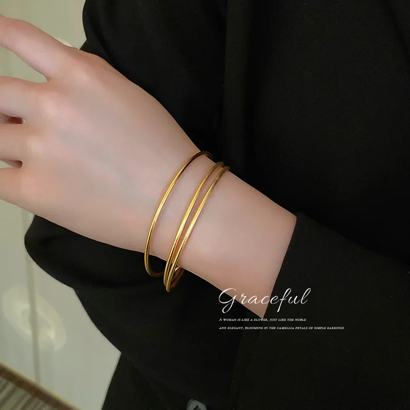 

Stacked and Worn Three Circles of Hollow Blessing Bracelet Simple Metal Texture Bracelet Niche Wild Girl Girlfriends Bracelet