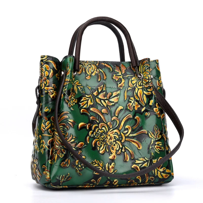 

New national style craft rubbing color trend women's bag three-dimensional embossed women's oblique cross bag head layer cowhide