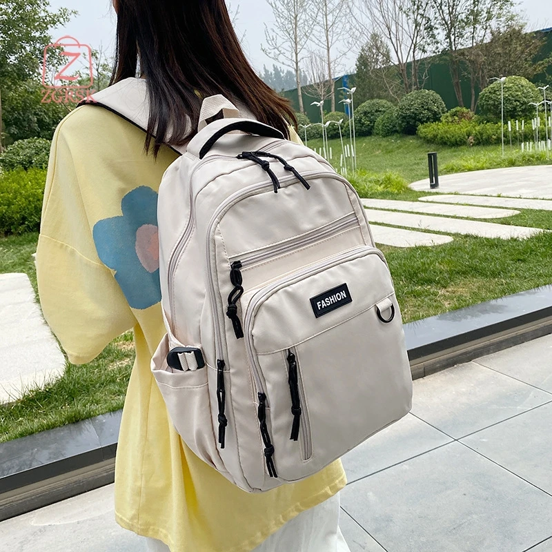 

2021 New Style Cool High-capacity Student Schoolbag High-quality Multi-pocket Female Backpack Simple Solid Color Backpack Women